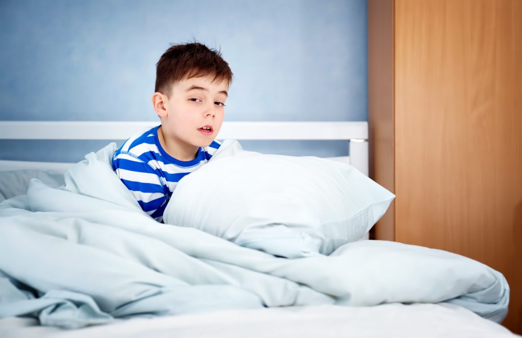 Sleepy Boy Sitting In Bed Sensory Stepping Stones